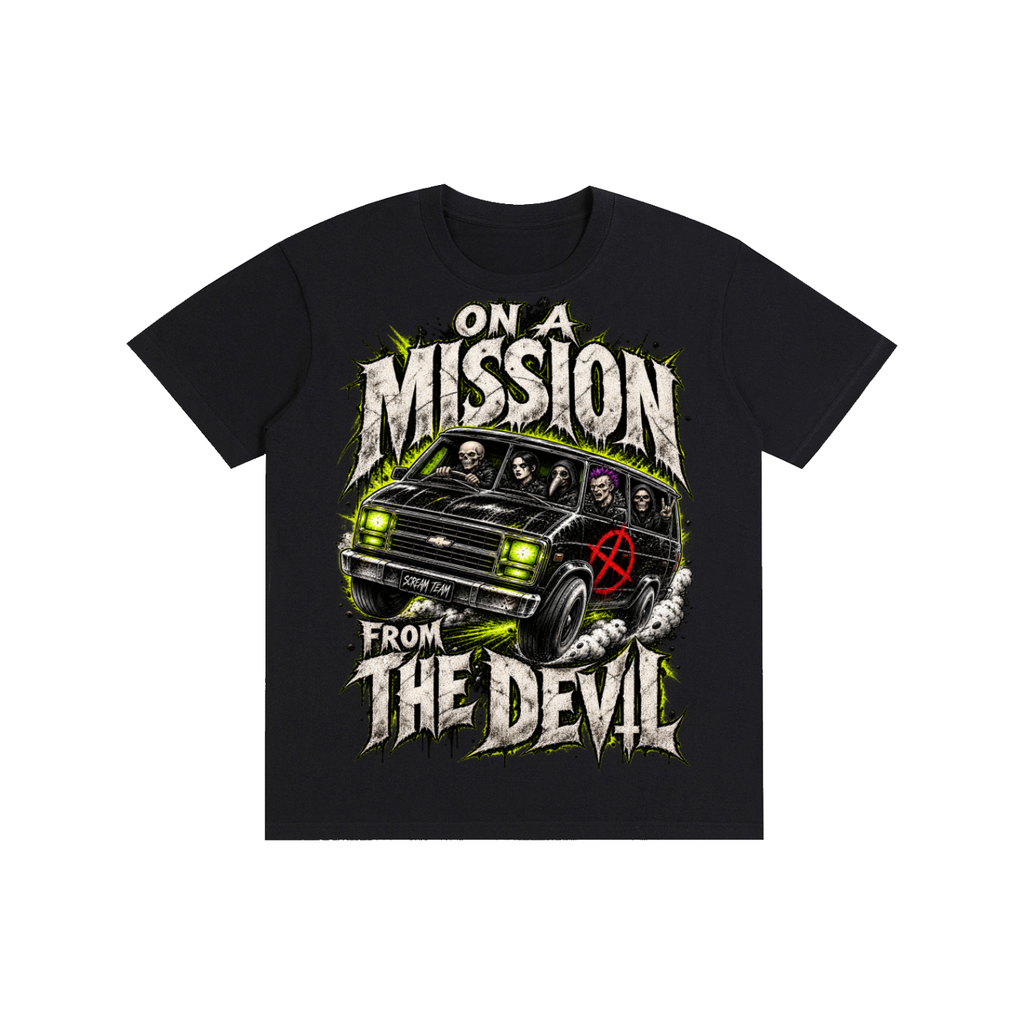 A black short-sleeve crewneck t-shirt featuring a large graphic print on the front. The graphic shows a black SUV with a red anarchy symbol on its side window, surrounded by green splatters and the distressed white text 'ON A MISSION FROM THE DEVIL'.